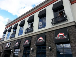 window accent awnings for a restaurant